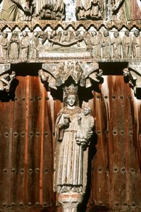 The west portal with statue of Madonna and Child and relief of the Last Judgement by Spanish School