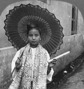 Young Burmese Woman Holding a Huge Cigar, Rangoon, Burma by Stereo Travel Co