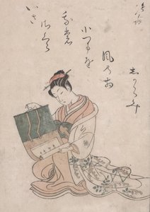 Beauty Unrolling Scroll by Suzuki Harunobu