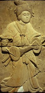 Stele depicting a musician by Tang Dynasty Chinese School