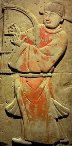 Terracotta stele with musician, Tang Dynasty (618-907), discovered in Shaanxi Province, Steles Forest Museum in Xian. Photography, Leonard de Selva, China, 2006. by Tang Dynasty Chinese School
