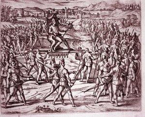 The Inca king, Atahualpa, holding a scepter in the shape of a sun, is carried on a litter to meet Francisco Pizarro (Engraving)
