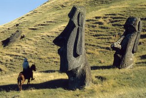 Easter Island monoliths called moai in a volcanic landscape are ancient sentinels