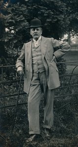 A gentleman wearing a suit and bowler hat by Unbekannt