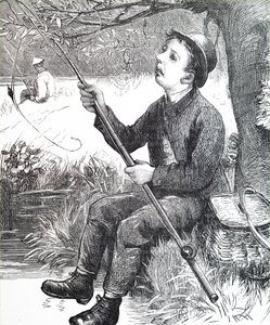 A young boy fishing
