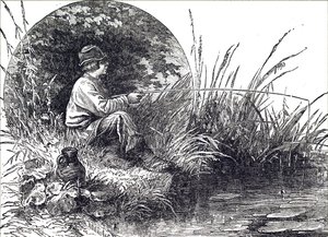 A young boy fishing