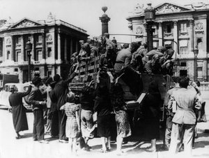 French street sellers offering souvenirs to a truckload of German soldiers, Paris, 27 July 1940 by Unbekannt