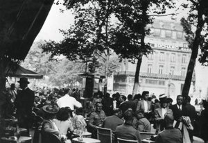 German army officers relaxing outside the Cafe de la Paix, Paris by Unbekannt