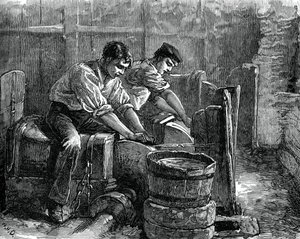 Grinders at work on a wheel, c1880 by Unbekannt