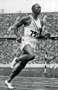 Jesse Owens at the End of the 100m at the Berlin Olympic Games, 1936