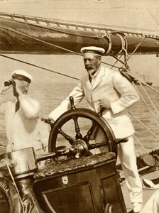 King George V at the wheel of his yacht, Britannia, during Cowes Regatta week by Unbekannt