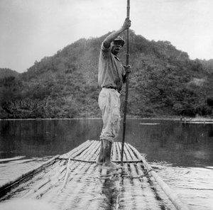 Man on a raft, Kingston, Jamaica