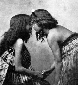 Maori girls rubbing noses