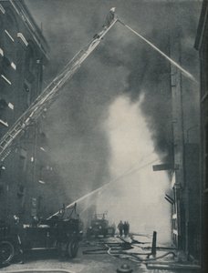 Massed Forces of the Modern Fire-Fighter Pitted Against a City Blaze