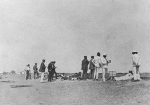 Men at a Rifle Range