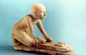 Model of a baker kneading dough and forming loaves, Ancient Egyptian