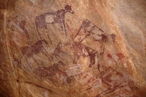 Rock Art, Prehistory: Painting of a Group of Cattle and Characters in an Ornate Shelter, Uweinat Massif, Sudan
