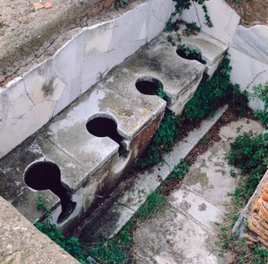 Roman Toilet, Ostia, Italy by Unbekannt