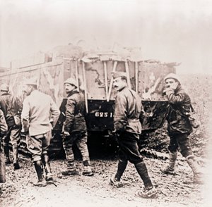 Soldiers Walking Behind Tank, c1914-c1918