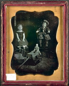 Two Children with Toys