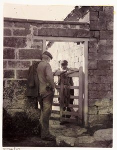 Two men talking over a gate, c 1905 by Unbekannt