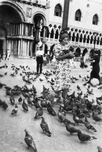 Woman surrounded by pigeons, St Marks Square, Venice, Italy, 1938 by Unbekannt