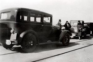 Women and parked cars by Unbekannt