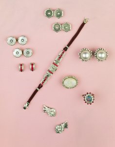 Selection of Art Deco jewellery; calibre cut ruby watch; button, cufflink and studs; earrings; Mabe pearl and diamond earrings by Unbekannt Unbekannt