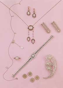 Selection of Edwardian and Art Deco jewellery: opal earrings and pendant; diamond neglige pendant; ostrich plume brooch; diamond and onyx cufflinks and studs by Unbekannt Unbekannt