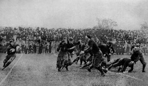 North America. Midfield play at an American football match. 1920 by Unbekannt
