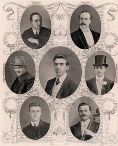 Seven of the eight members of the ship