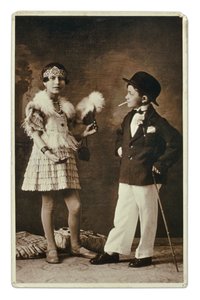 Two Children Dressed as Adults in the Fashion of the 1920s, the Little Girl Wears an Outfit for the Charleston, and Him in Suit, Bowler Hat and Cigarette