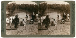 Baptising in the River Jordan, Palestine, 1903 by Underwood and Underwood