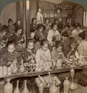Factory girls decorating cheap pottery for the foreign markets, Kyoto, Japan, 1904 by Underwood and Underwood