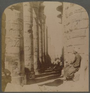The famous colonnade of the great Hypostyle Hall in the Temple of Karnak, Thebes, Egypt, 1897 by Underwood and Underwood