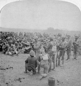The Overpowered Boer Prisoners Resting on the Road from Paardeberg to Modder River, 1900 by Underwood and Underwood