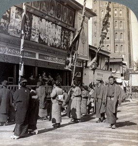 Watching a Free Show on Theatre Street, Looking North to Asakusa Tower, Tokyo, Japan, 1904 by Underwood and Underwood