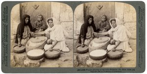 Women Grinding at the Mill, Palestine by Underwood and Underwood