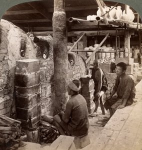 Workmen watching kilns full of Awata porcelain, Kinkosan works, Kyoto, Japan, 1904 by Underwood and Underwood