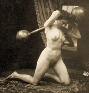 Female Nude Exercising with a Globe Barbell