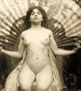 Female Nude Posing with a Large Fan