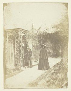 Unidentified Woman and Two Men Standing Outdoors