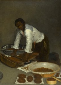 A Man Scraping Chocolate