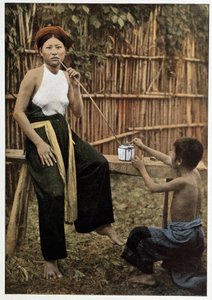 Asian woman smoking opium, circa 1898 by Unknown artist