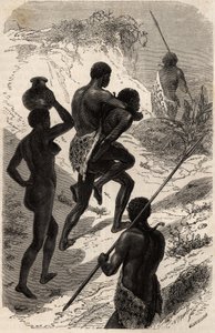 His majesty Katchiba on a journey, leader of the Obbos tribe (tribe of the White Nile region), on the back of one of his subjects and always accompanied by two others so that they serve alternately as a guide and a mount, a woman accompanies them who wears
