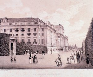 Walkers in the park of Schonbrunn Palace in Vienna