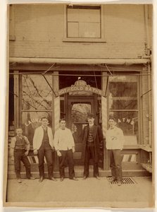 Four Men and a Boy Standing in Front of a Public Bath House by Unknown artist