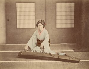 Japanese Woman Playing a Koto by Unknown artist