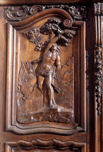 The martyrdom of Saint Sebastian, (detail) of the carved wooden door of the church of the immaculate conception, Menton