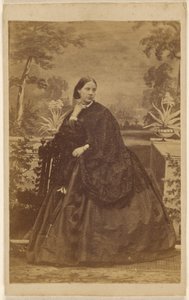 Unidentified woman seated, with hand to collar by Unknown artist
